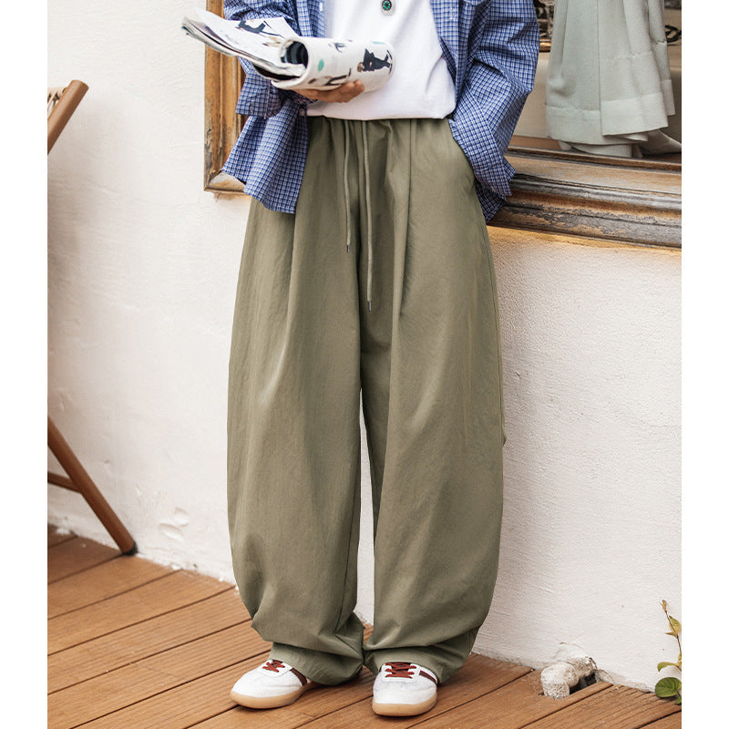 Tapered Trousers With A Drawstring Hem